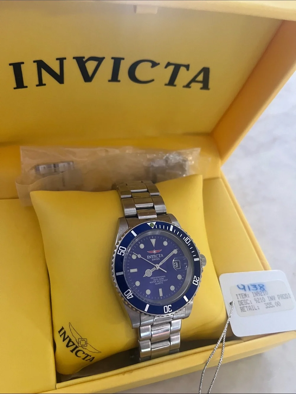 Invicta Silver Stainless Steel Watch with Blue Dial and Bezel